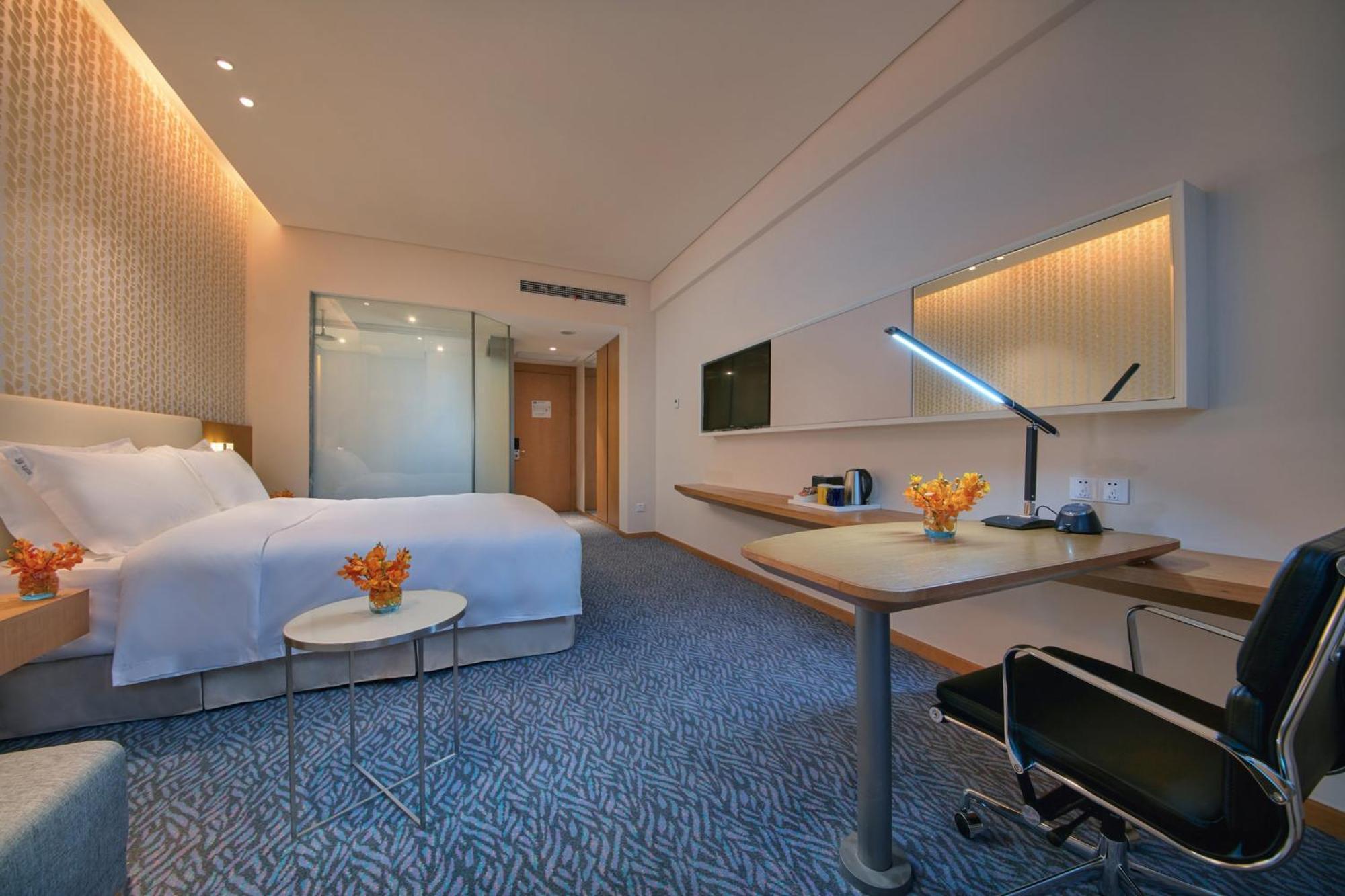 Holiday Inn Express Nantong Textile City By Ihg Экстерьер фото